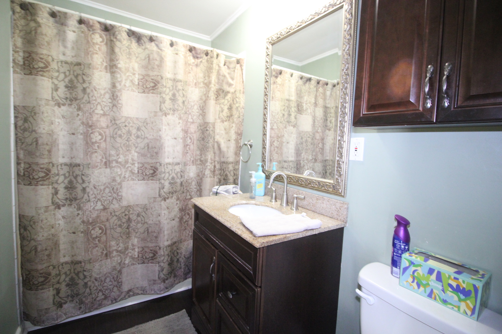 8001 South Kilpatrick Avenue Chicago, IL 60652 - Photo 13 of 25 a bathroom with a sink and a mirror