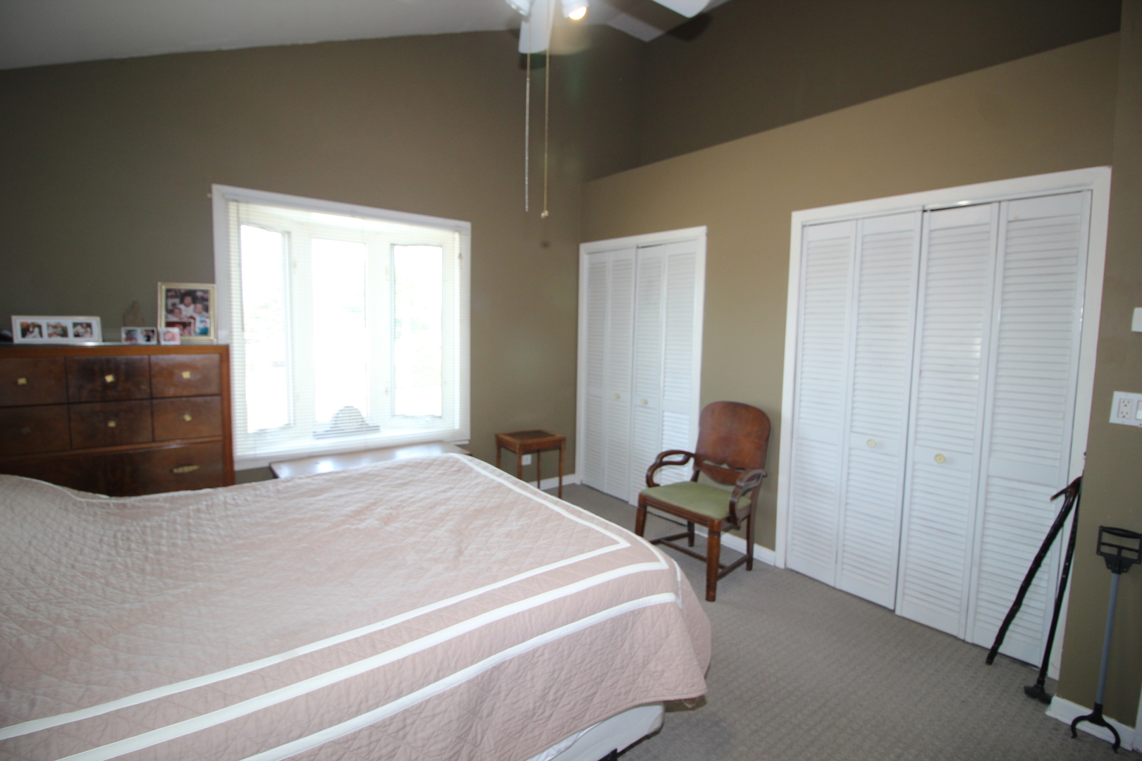 8001 South Kilpatrick Avenue Chicago, IL 60652 - Photo 14 of 25 a bedroom with a bed and chair