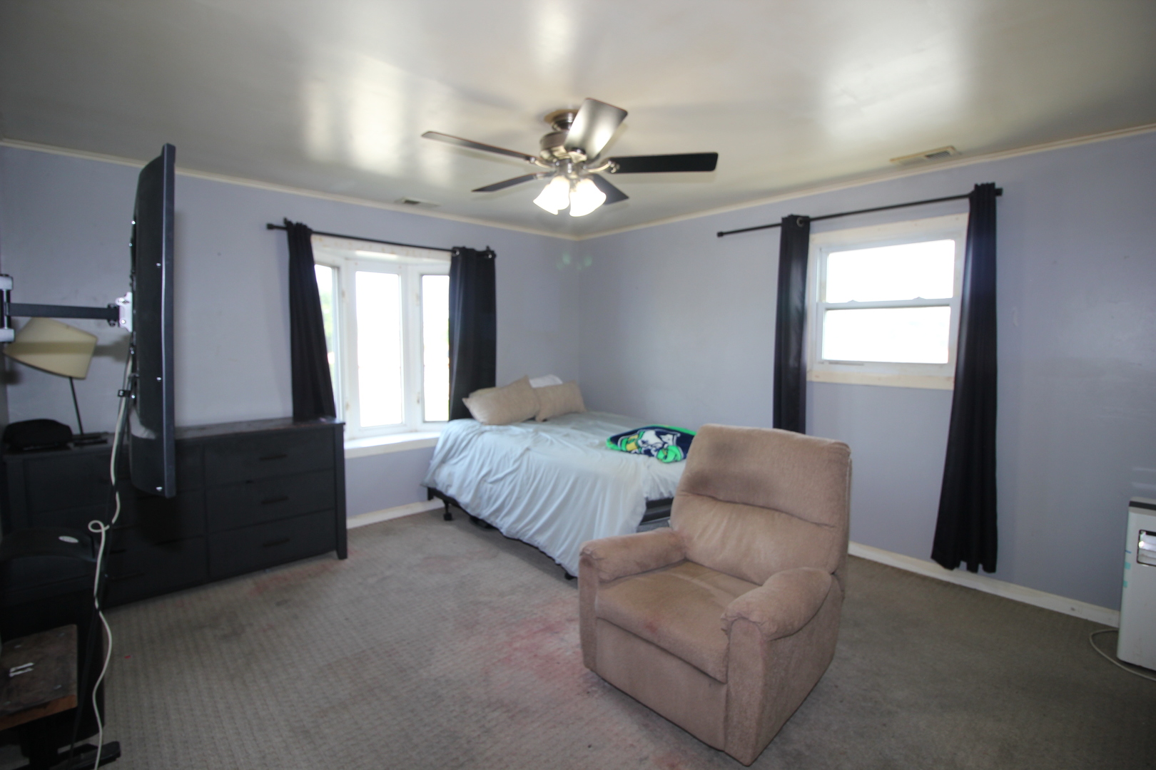 8001 South Kilpatrick Avenue Chicago, IL 60652 - Photo 17 of 25 a living room with furniture and a chandelier