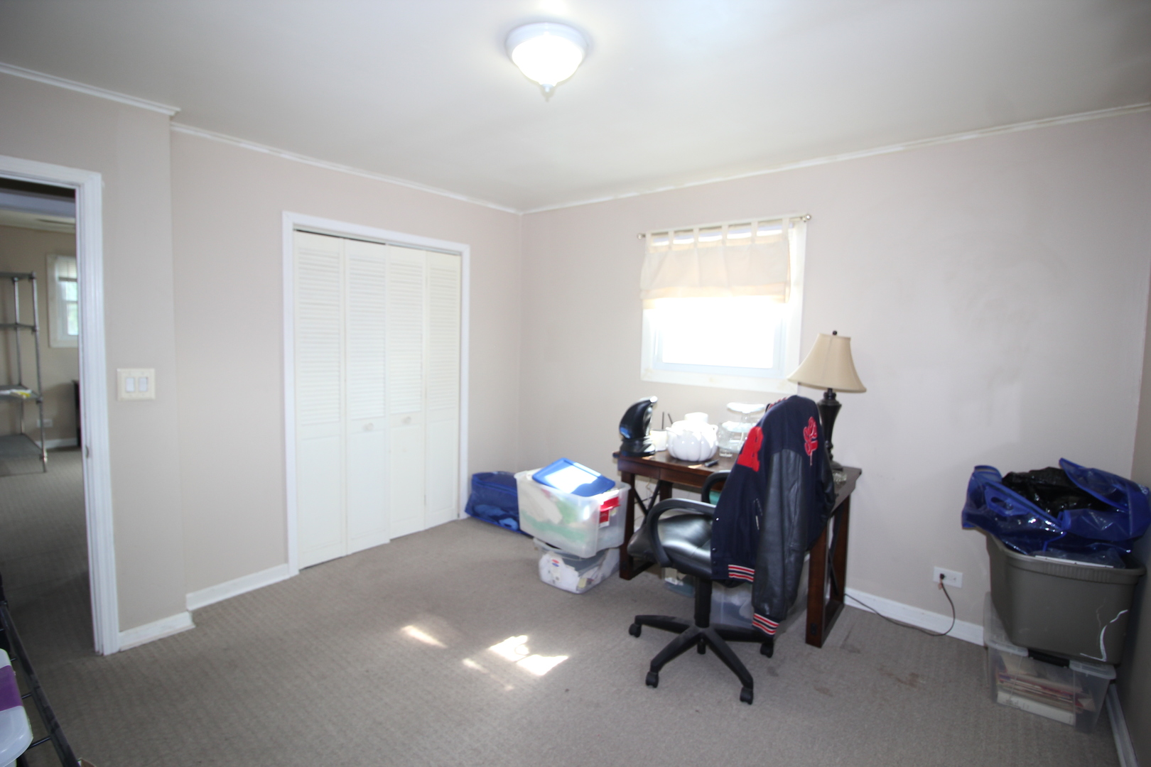 8001 South Kilpatrick Avenue Chicago, IL 60652 - Photo 21 of 25 a view of a workspace with furniture and a window