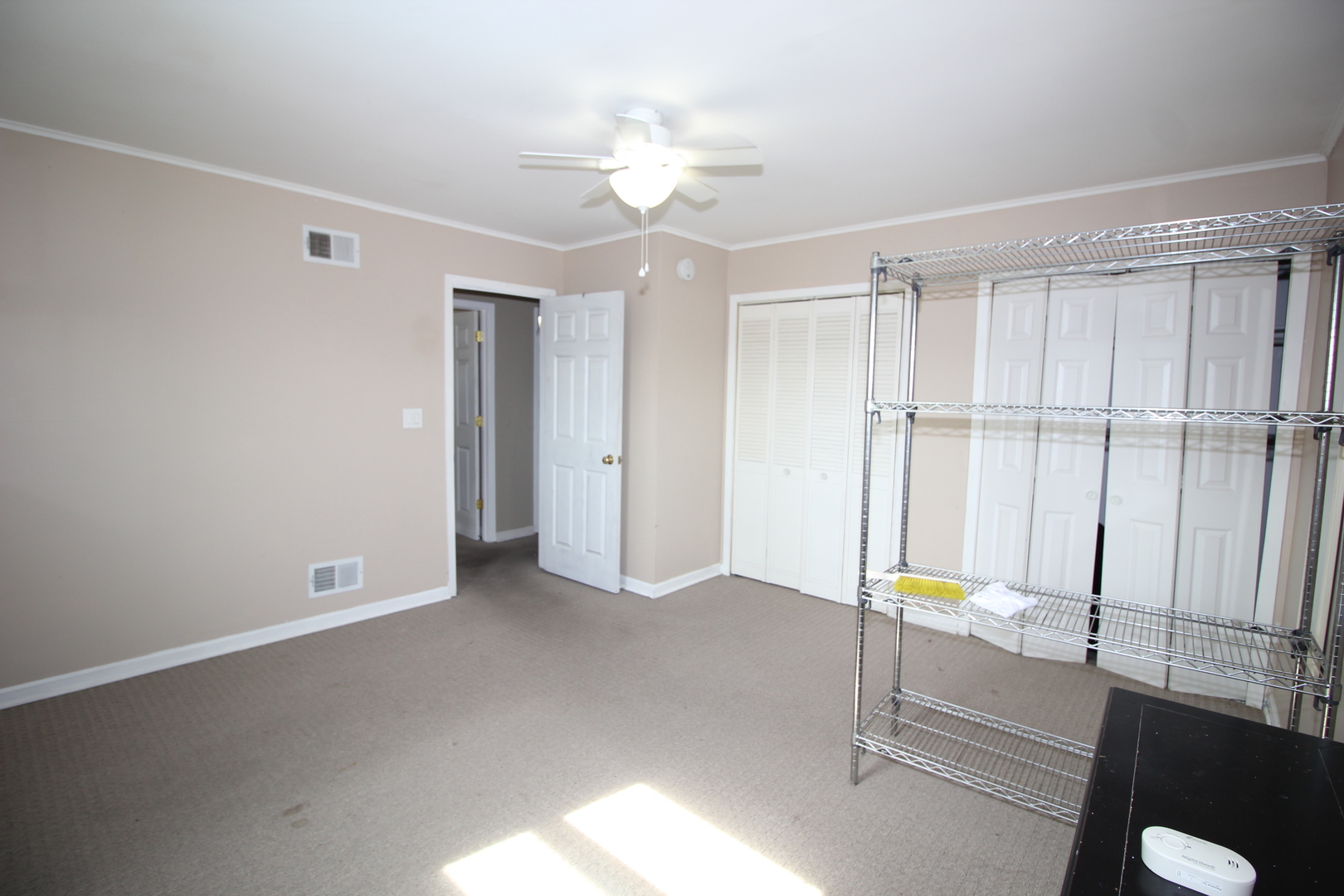 8001 South Kilpatrick Avenue Chicago, IL 60652 - Photo 23 of 25 a view of an empty room with a window