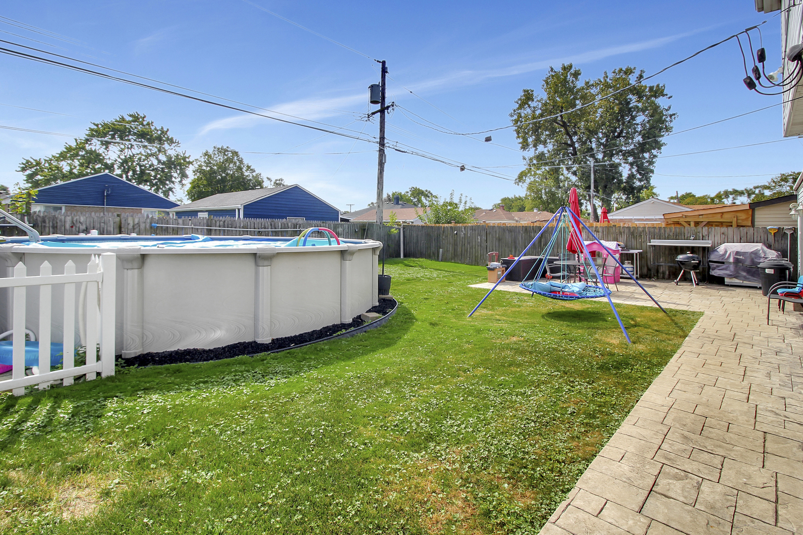 8001 South Kilpatrick Avenue Chicago, IL 60652 - Photo 24 of 25 a view of a house with a yard and sitting area