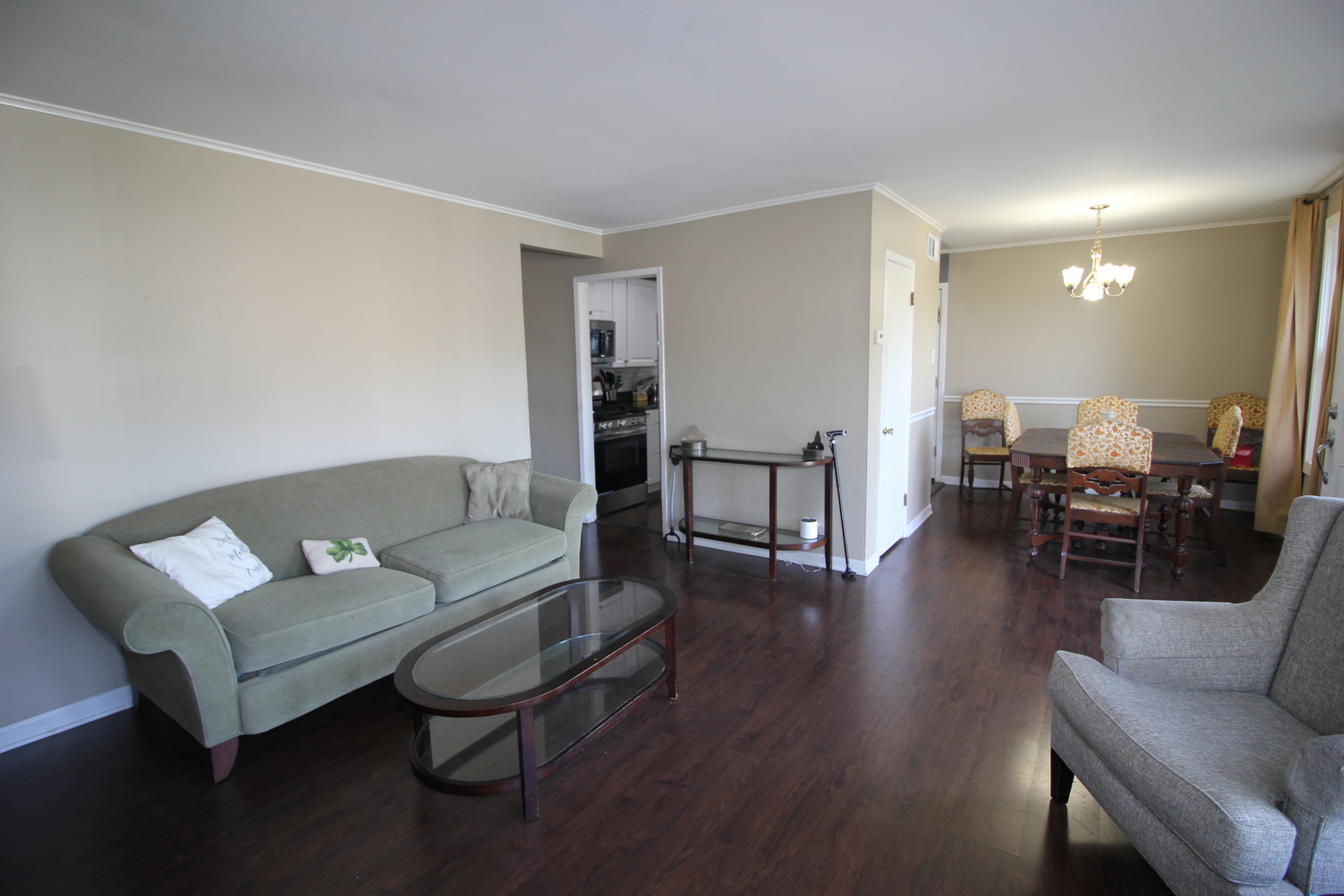 8001 South Kilpatrick Avenue Chicago, IL 60652 - Photo 3 of 25 a living room with furniture and wooden floor