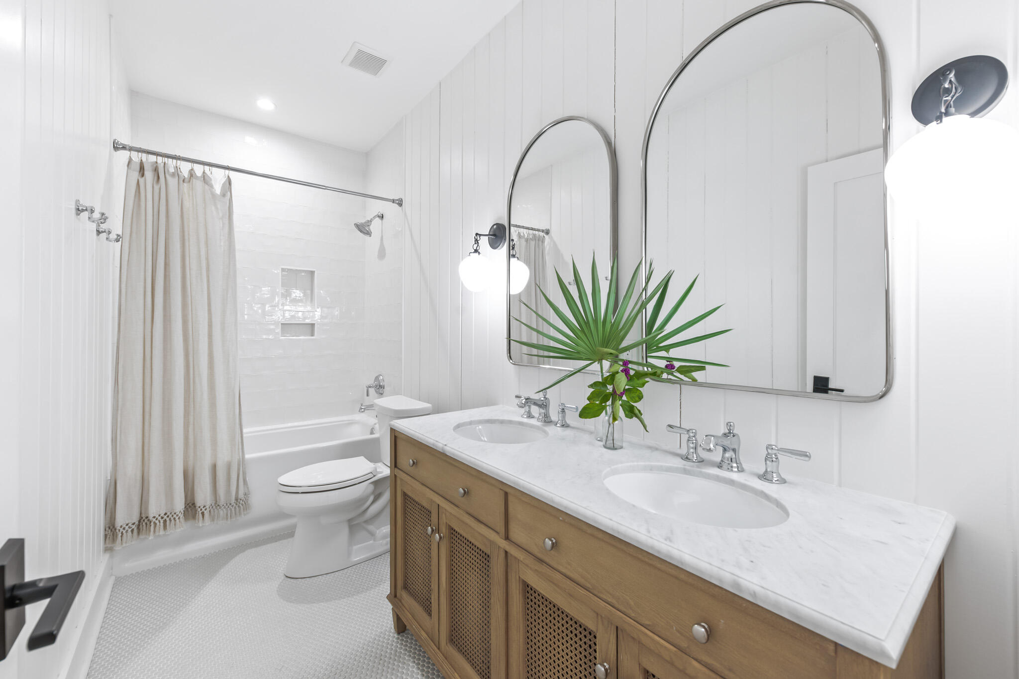 375 Defuniak Street Santa Rosa Beach, FL 32459 - Photo 54 of 94 a bathroom with a granite countertop sink a toilet and a mirror