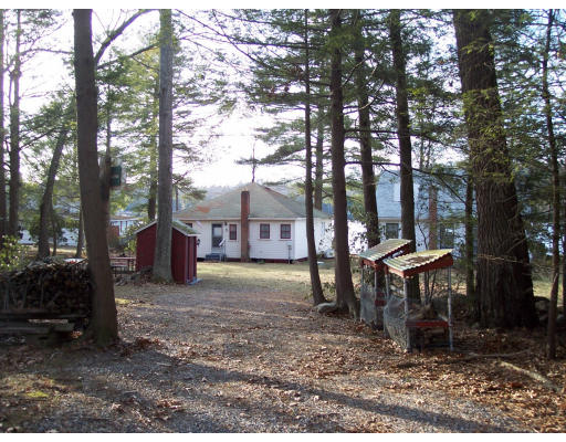 200 Lake Road Sturbridge, MA 01518 - Photo 6 of 6 a view of a house with a yard and sitting area