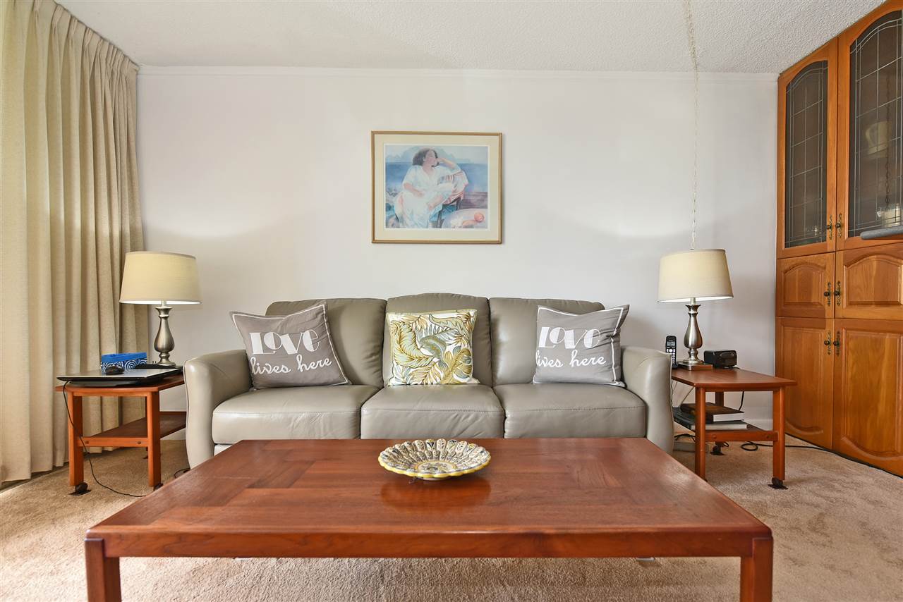 120 Hui Rd F, Unit B5 Lahaina, HI 96761 - Photo 25 of 28 a living room with furniture and a lamp