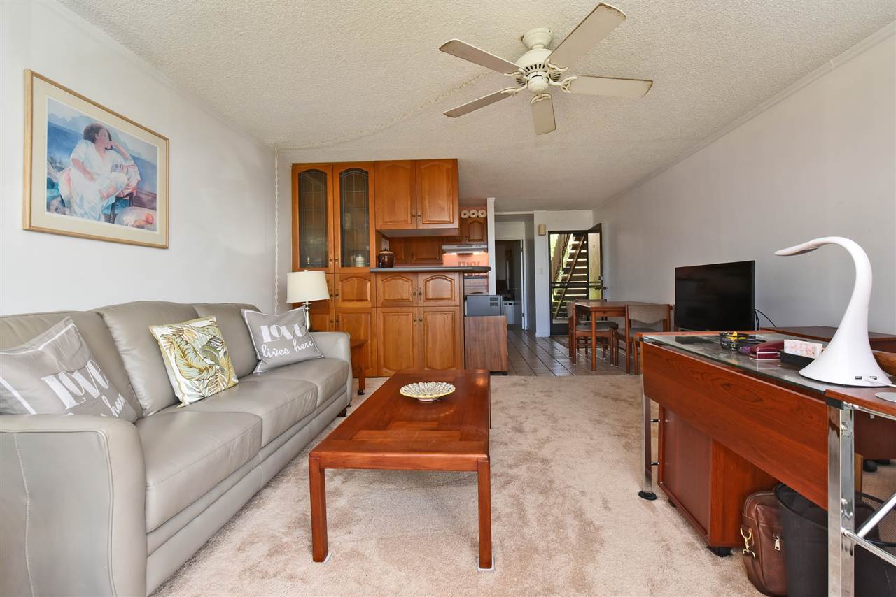 120 Hui Rd F, Unit B5 Lahaina, HI 96761 - Photo 28 of 28 a living room with furniture and a flat screen tv