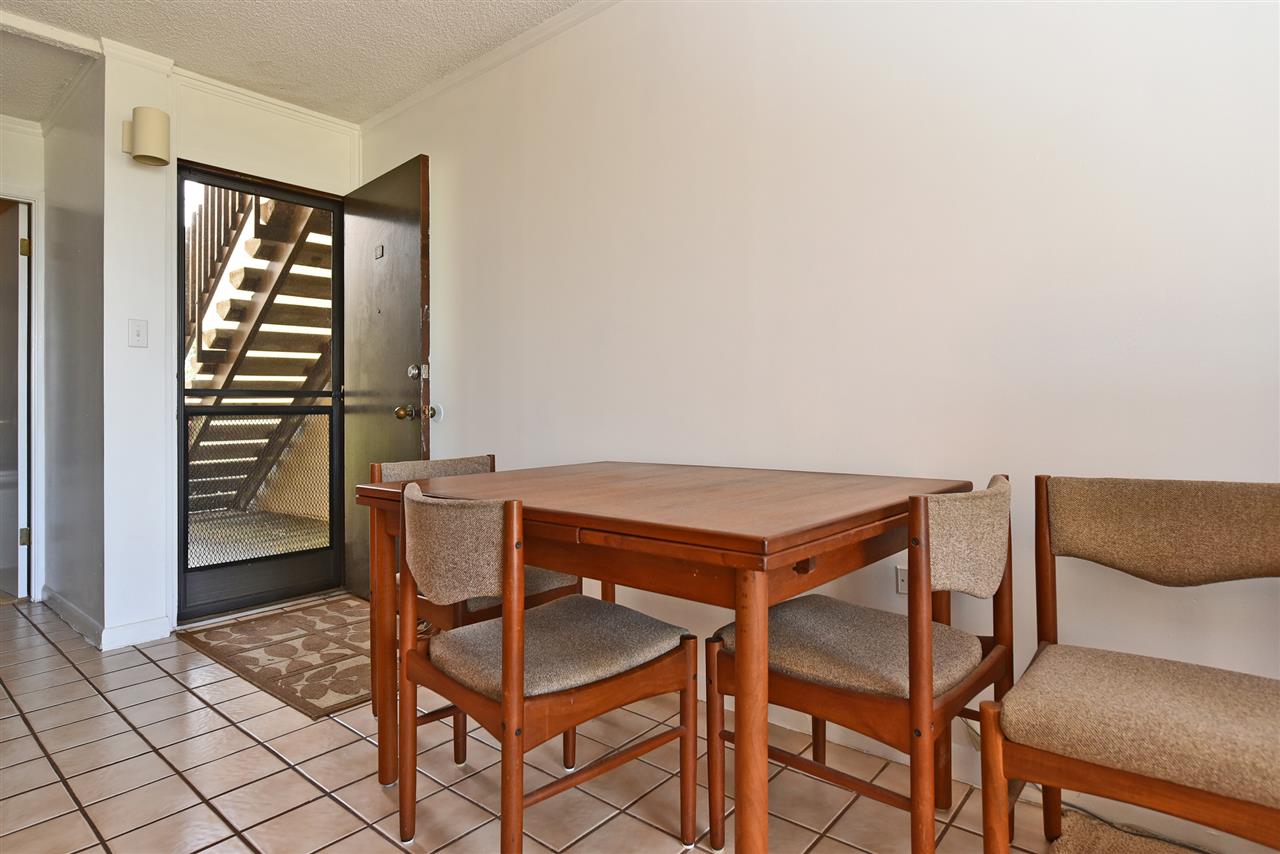 120 Hui Rd F, Unit B5 Lahaina, HI 96761 - Photo 8 of 28 a view of a dining room with furniture and wooden floor