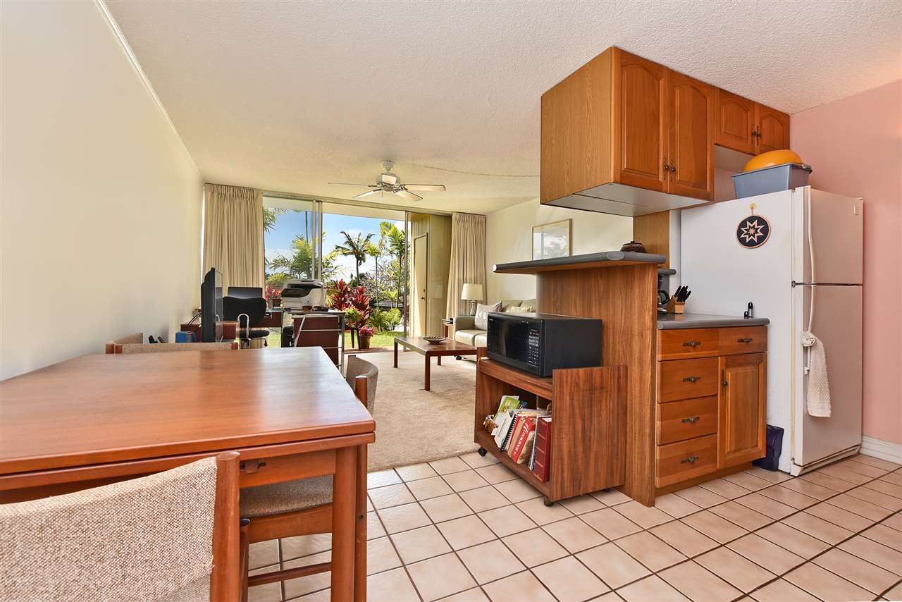 120 Hui Rd F, Unit B5 Lahaina, HI 96761 - Photo 9 of 28 a view of kitchen and dining room with furniture