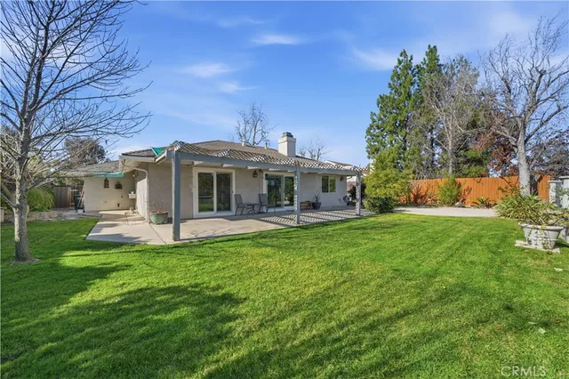 a front view of a house with garden and porch