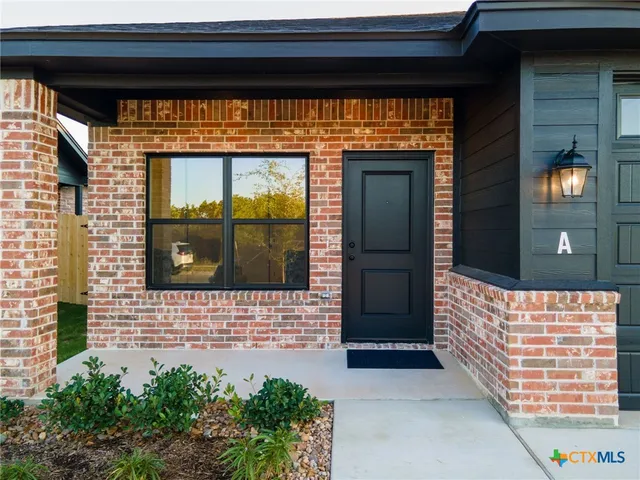 a front view of a house with a window