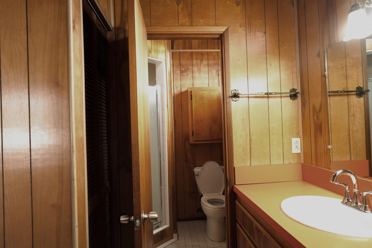 883 Hele Mauna Street Hilo, HI 96720 - Photo 15 of 26 a bathroom with a sink toilet and shower