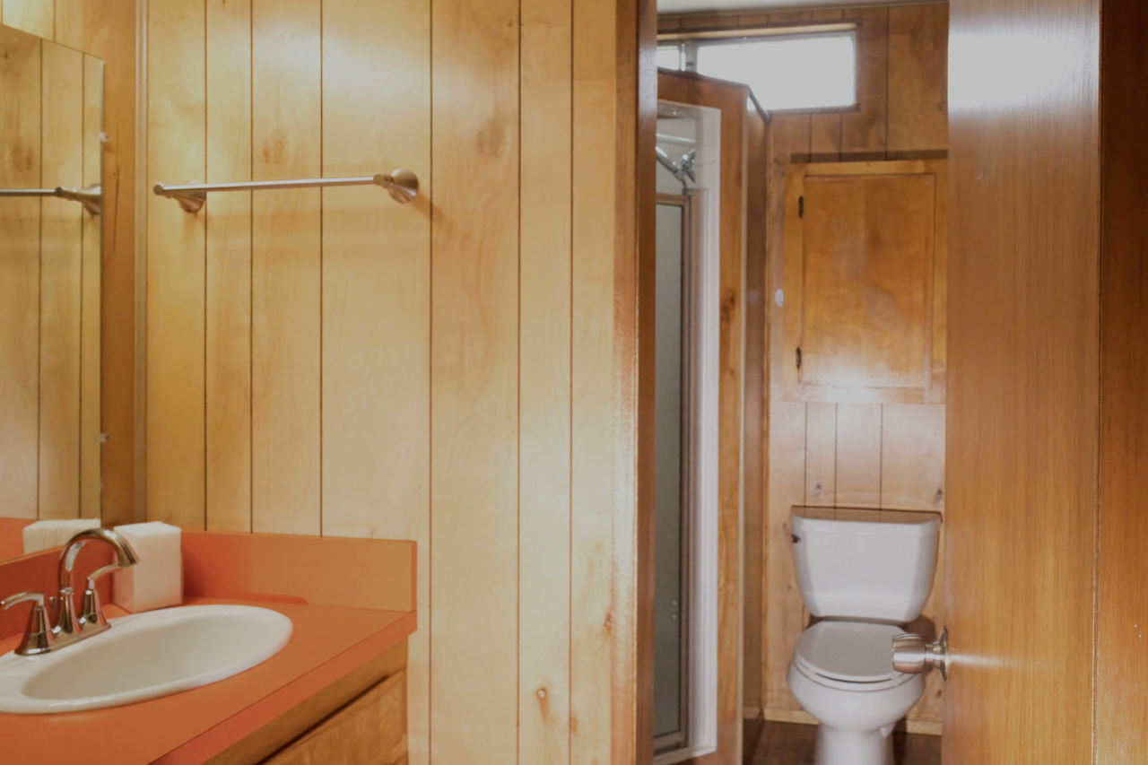 883 Hele Mauna Street Hilo, HI 96720 - Photo 20 of 26 a bathroom with a sink toilet and shower