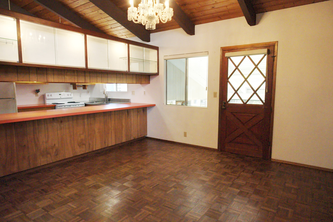 883 Hele Mauna Street Hilo, HI 96720 - Photo 9 of 26 a kitchen with sink cabinets and window