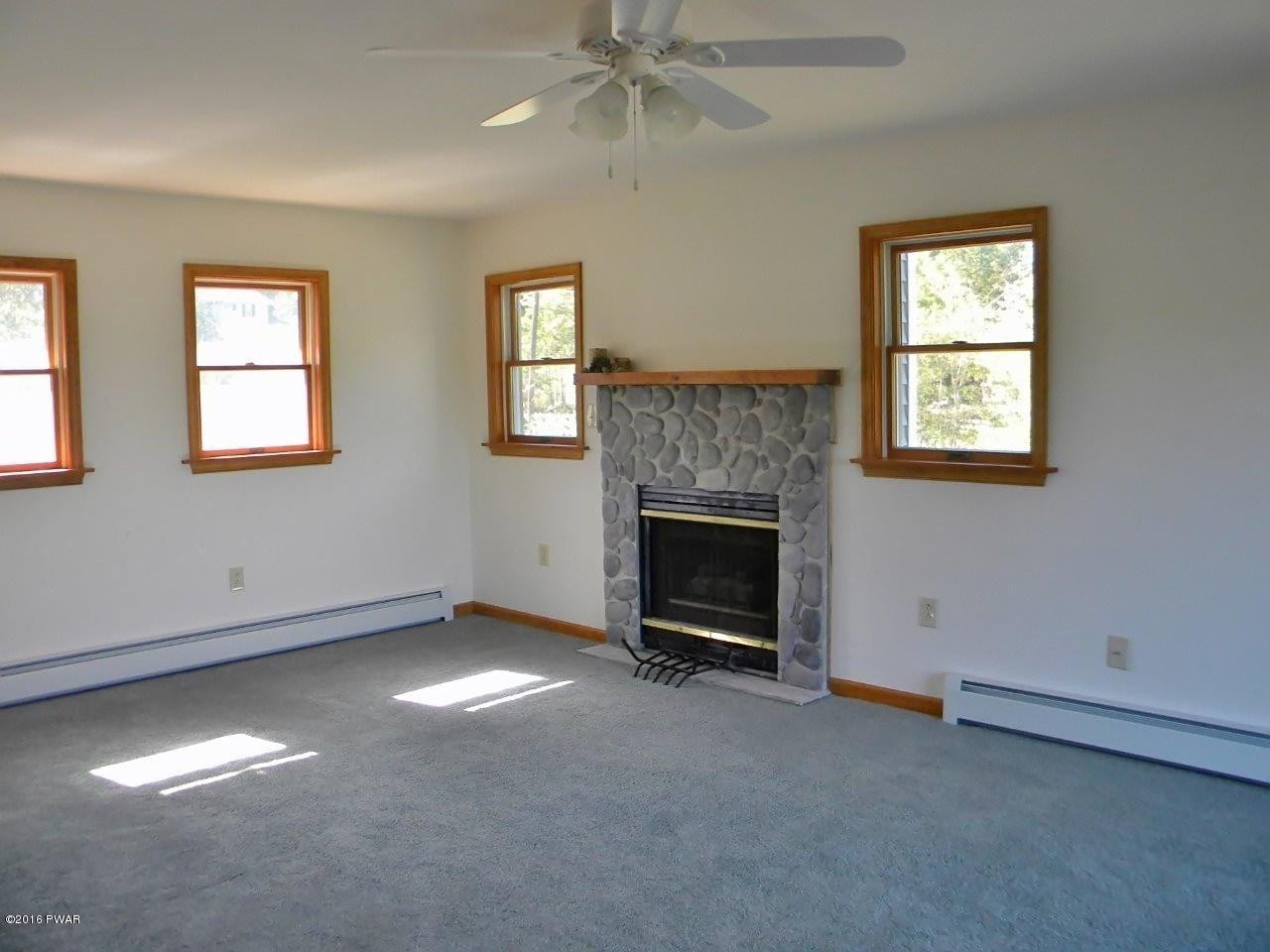 106 Hoadleys Road Hawley, PA 18428 - Photo 8 of 33 7a-fireplace
