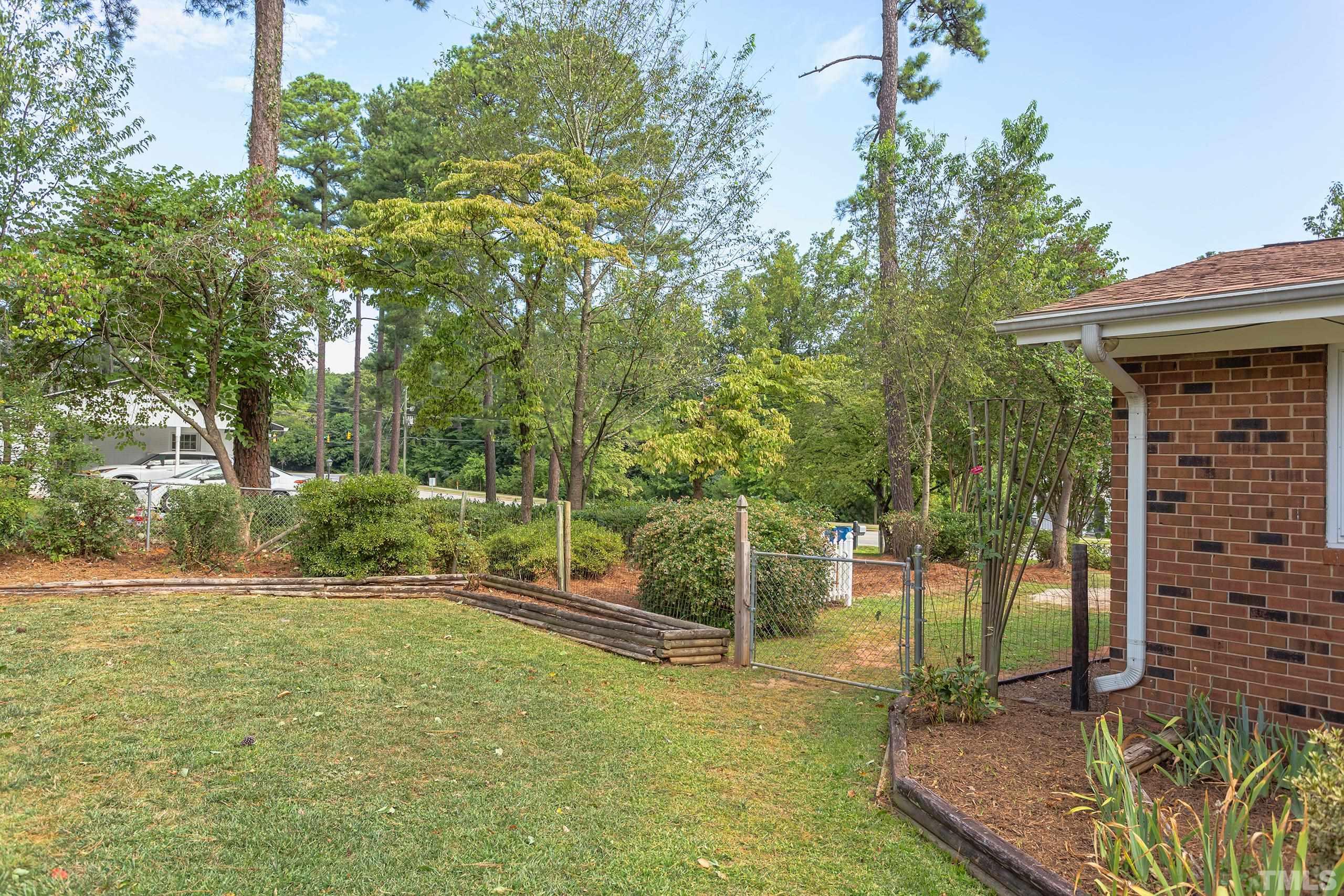 2312 Gresham Lake Road Raleigh, NC 27615 - Photo 41 of 46 a view of a backyard