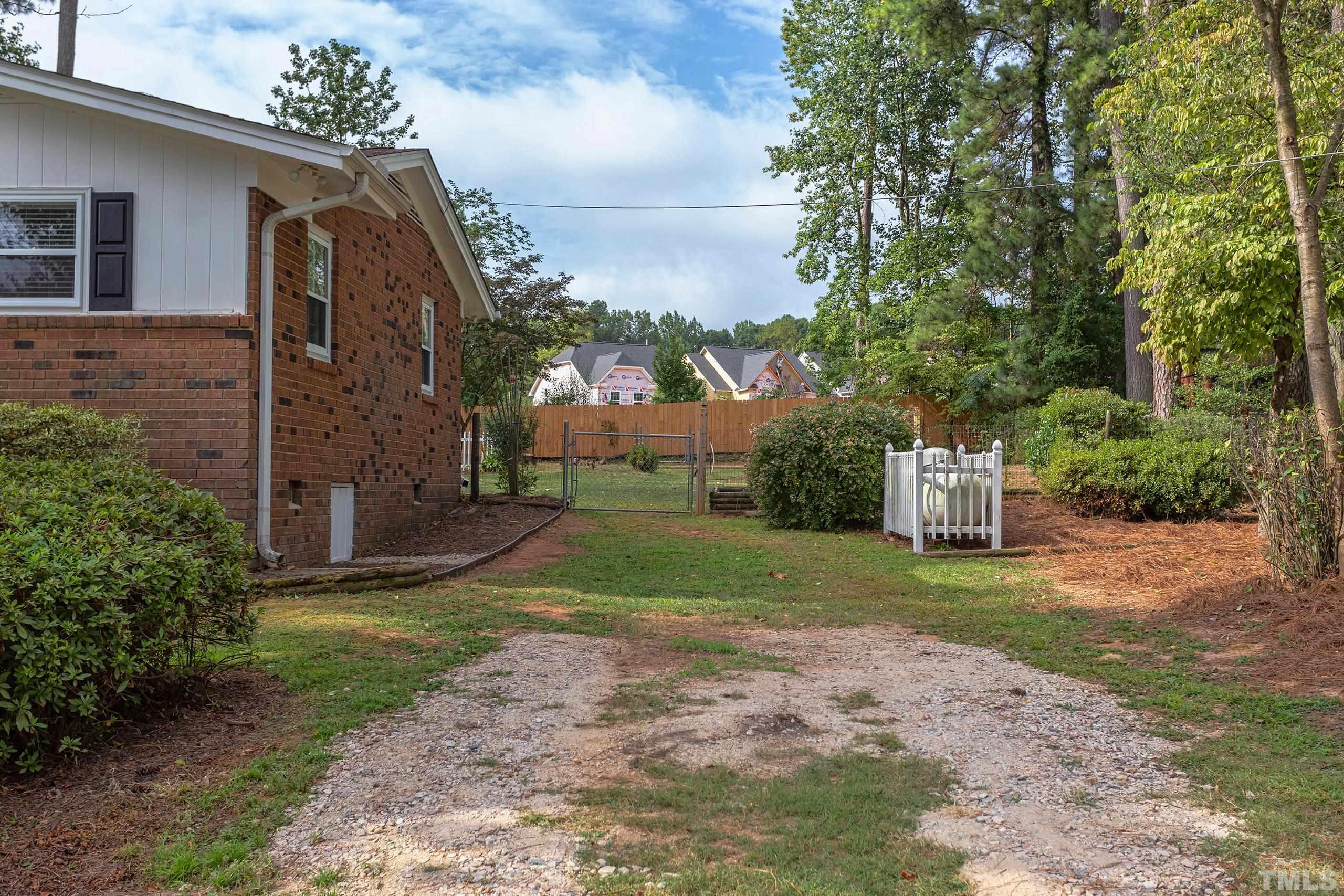 2312 Gresham Lake Road Raleigh, NC 27615 - Photo 42 of 46 a view of a back yard of the house