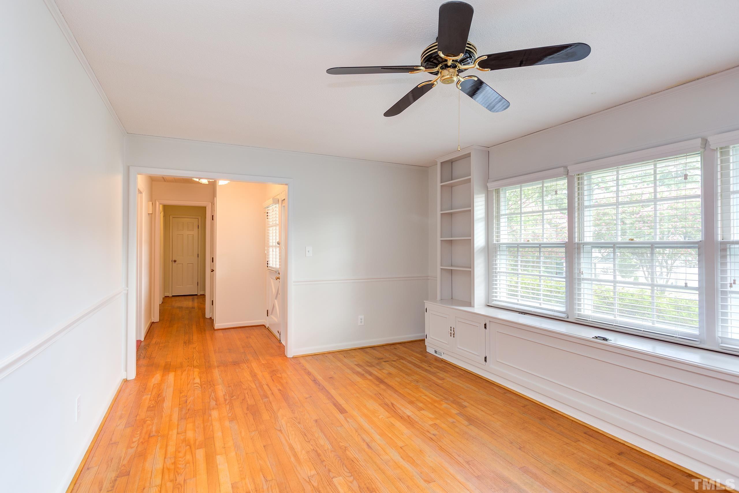 2312 Gresham Lake Road Raleigh, NC 27615 - Photo 9 of 46 a view of an empty room with a window
