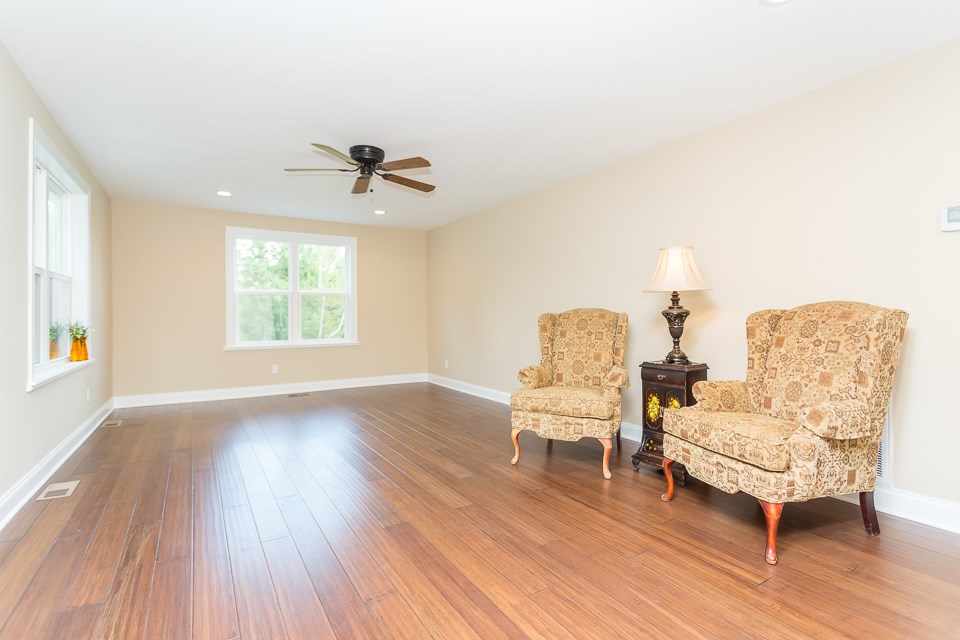 450 Whitmore Road Mount Solon, VA 22843 - Photo 3 of 43 a living room with furniture and a wooden floor