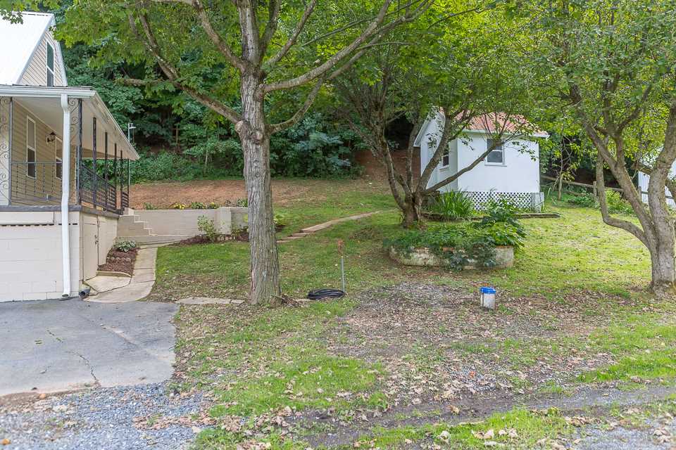 450 Whitmore Road Mount Solon, VA 22843 - Photo 39 of 43 a view of a yard in front of a house with large tree