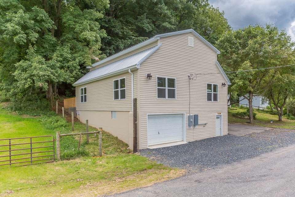 450 Whitmore Road Mount Solon, VA 22843 - Photo 41 of 43 a view of a house with a yard