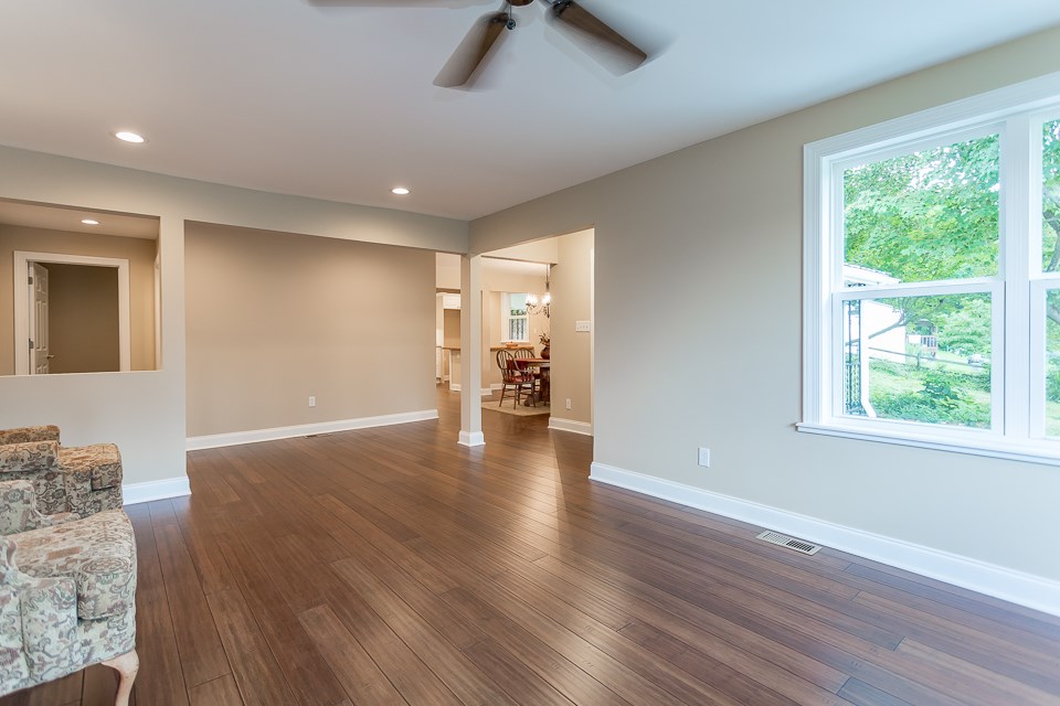 450 Whitmore Road Mount Solon, VA 22843 - Photo 6 of 43 a view of an empty room with wooden floor and a window