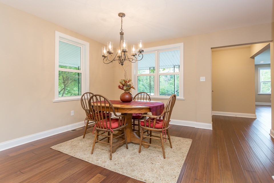 450 Whitmore Road Mount Solon, VA 22843 - Photo 9 of 43 a view of a dining room with furniture window and wooden floor