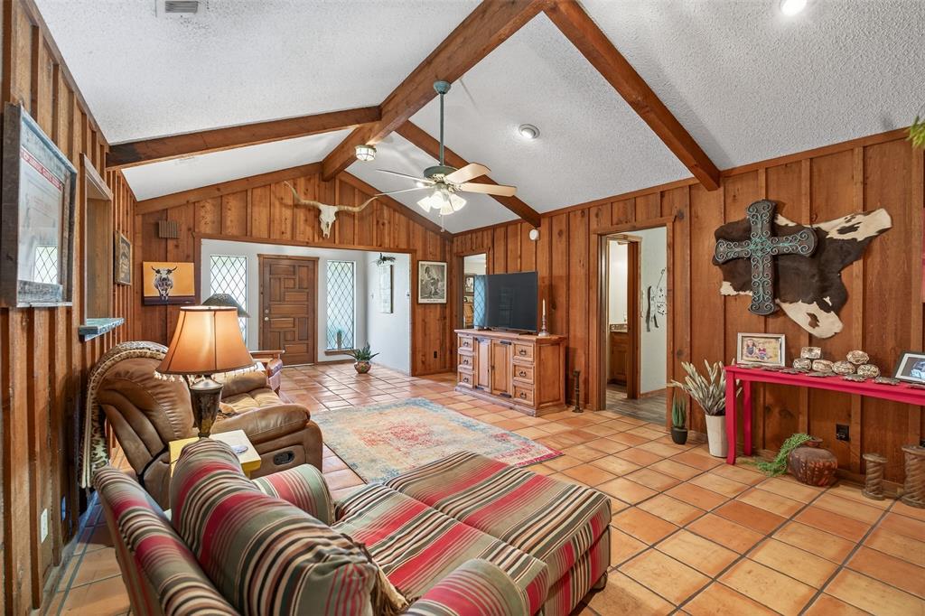 3030 Wager Road Flower Mound, TX 75028 - Photo 11 of 39 a bedroom with furniture and a chandelier