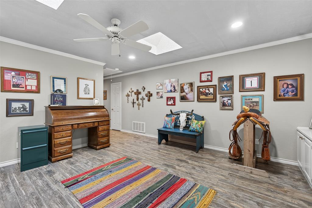 3030 Wager Road Flower Mound, TX 75028 - Photo 21 of 39 a bedroom with furniture and a bed