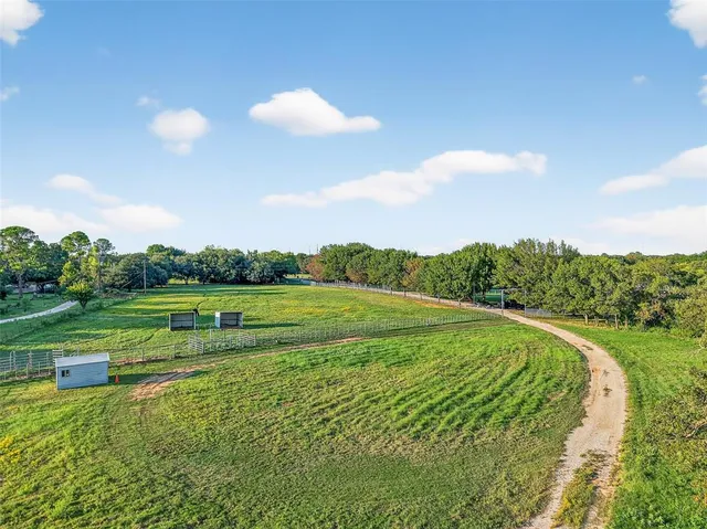 a view of a golf course with a lake