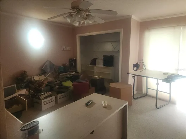 a view of kitchen and workspace