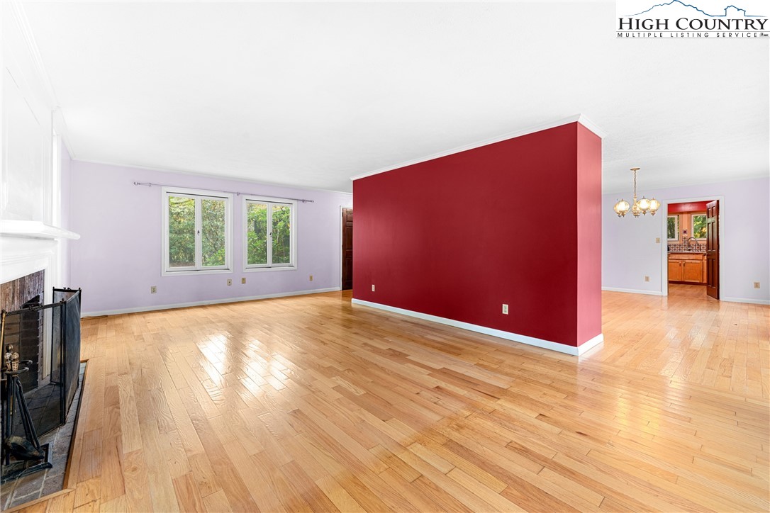 547 Deck Hill Road Boone, NC 28607 - Photo 16 of 50 a view of empty room with wooden floor