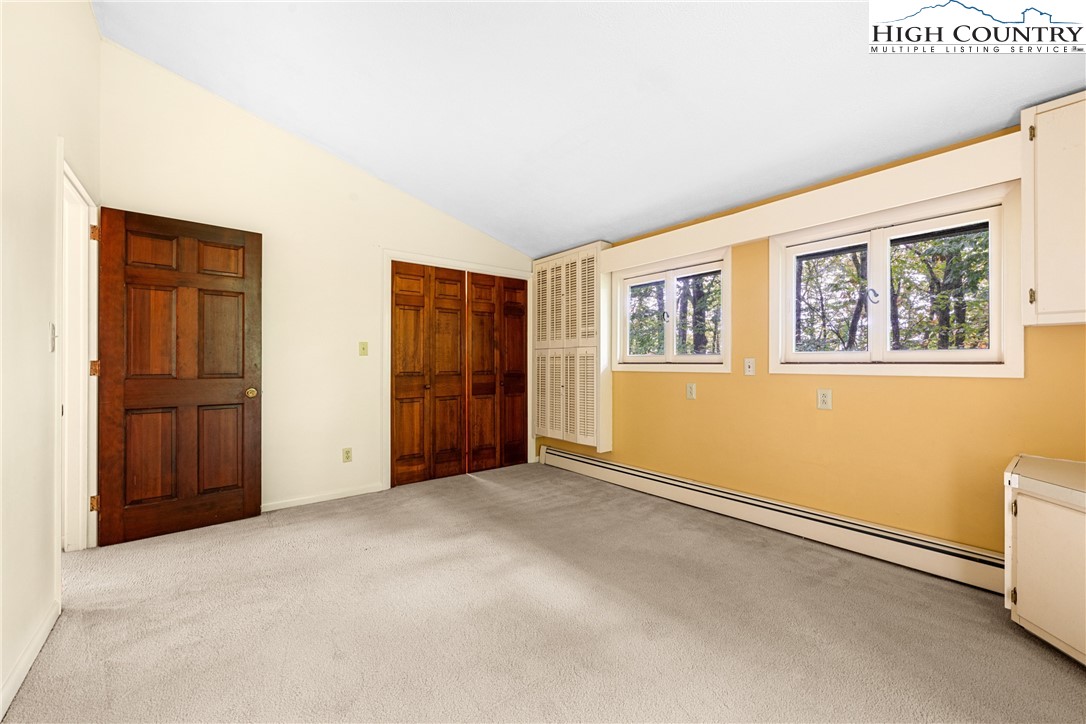 547 Deck Hill Road Boone, NC 28607 - Photo 34 of 50 an empty room with windows