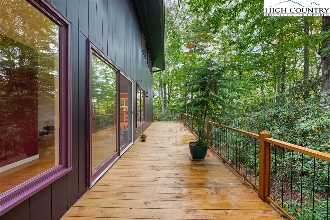 547 Deck Hill Road Boone, NC 28607 - Photo 8 of 50 a view of balcony with wooden floor