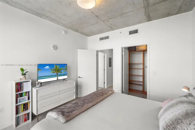 a bathroom with a sink toilet and a mirror