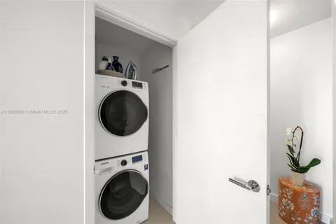 front view of a building with a garden