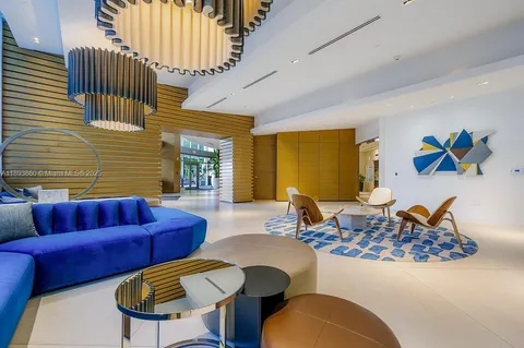 a view of a lobby with furniture and staircase