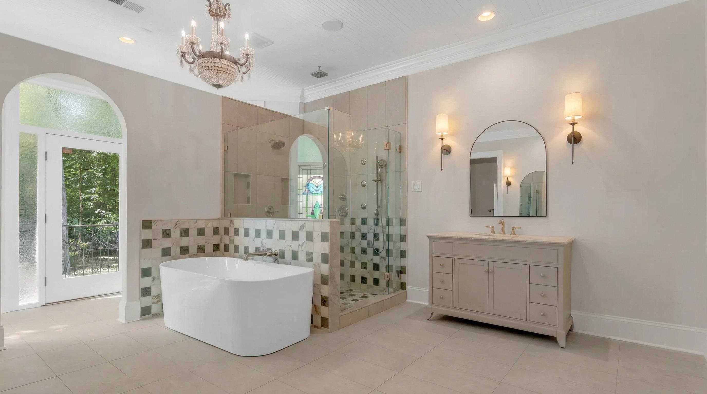 815 Dent Road Eads, TN 38028 - Photo 24 of 40 Full bathroom with vanity, a stall shower, a soaking tub, crown molding, and light tile patterned flooring