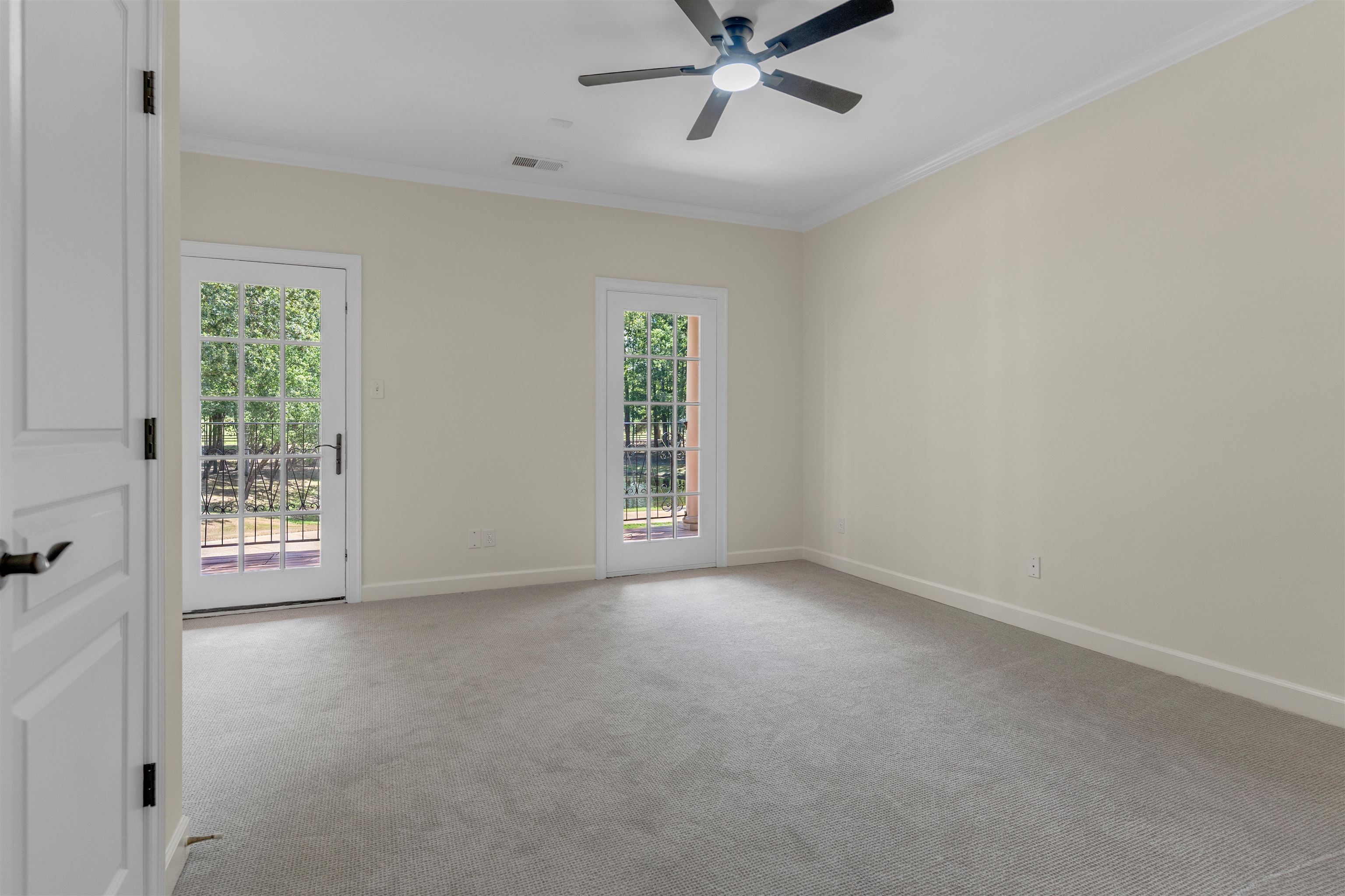 815 Dent Road Eads, TN 38028 - Photo 30 of 40 Unfurnished room featuring ornamental molding, light carpet, and ceiling fan