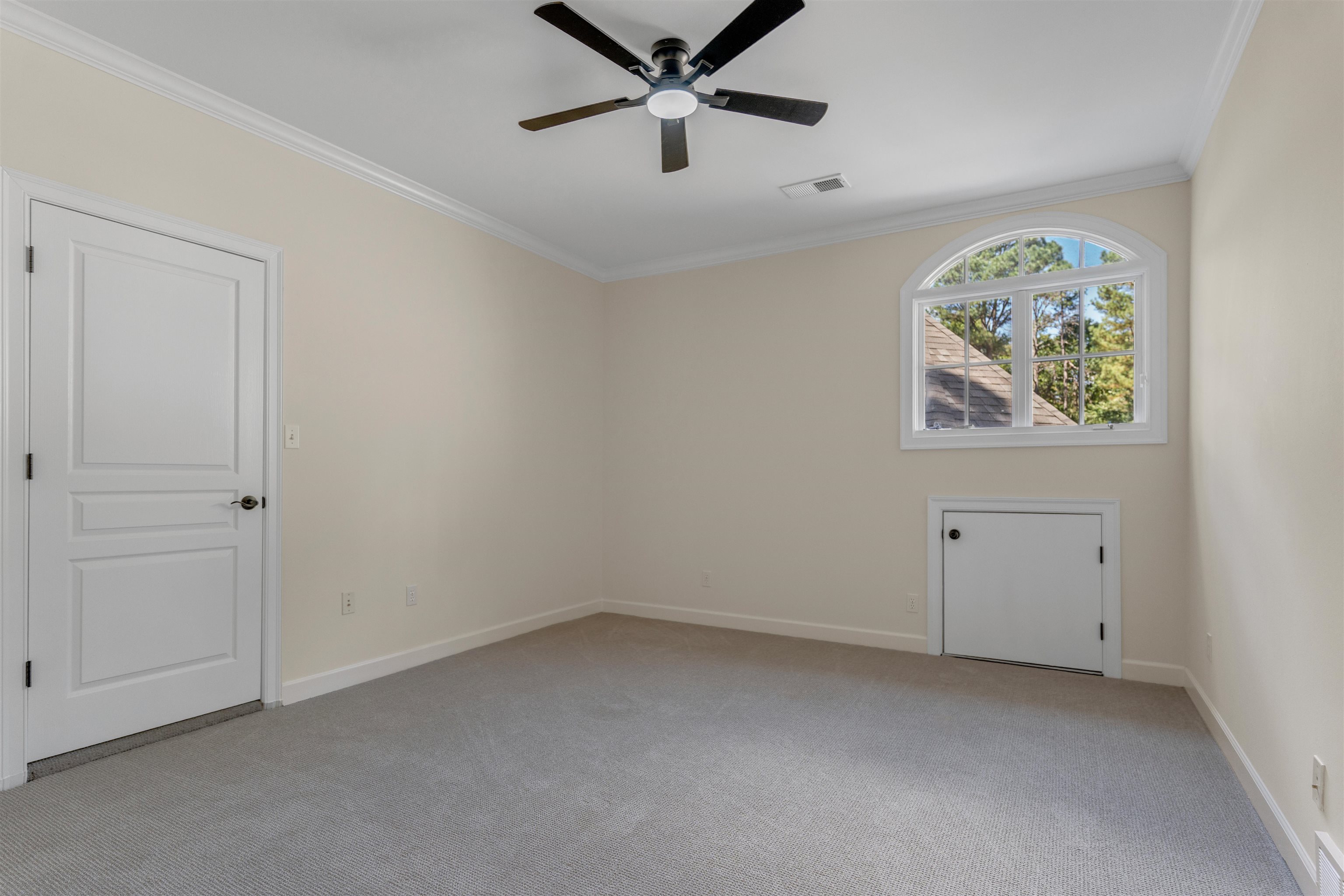 815 Dent Road Eads, TN 38028 - Photo 32 of 40 Unfurnished room with ornamental molding, light colored carpet, and a ceiling fan