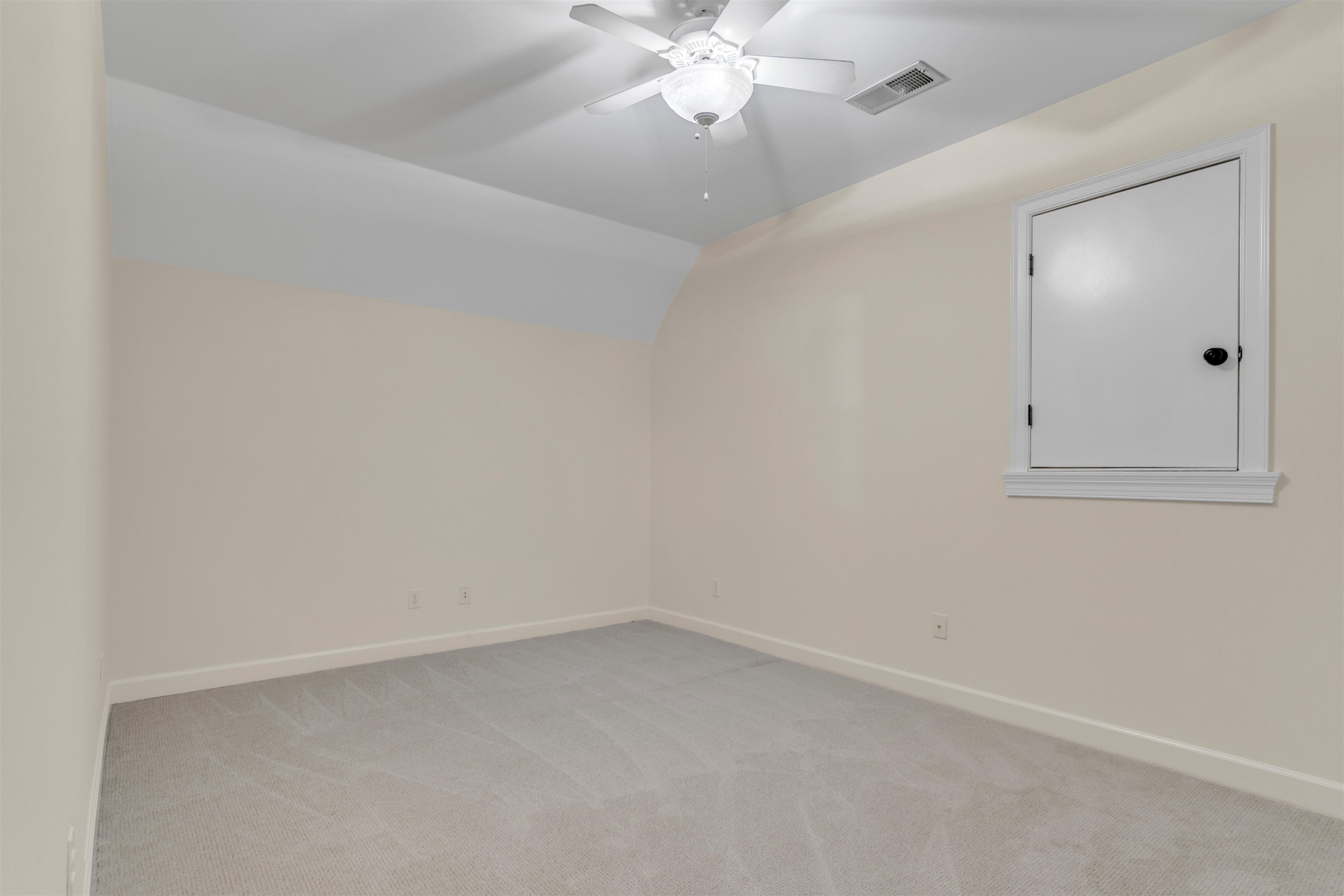 815 Dent Road Eads, TN 38028 - Photo 34 of 40 Spare room with vaulted ceiling, light carpet, and ceiling fan
