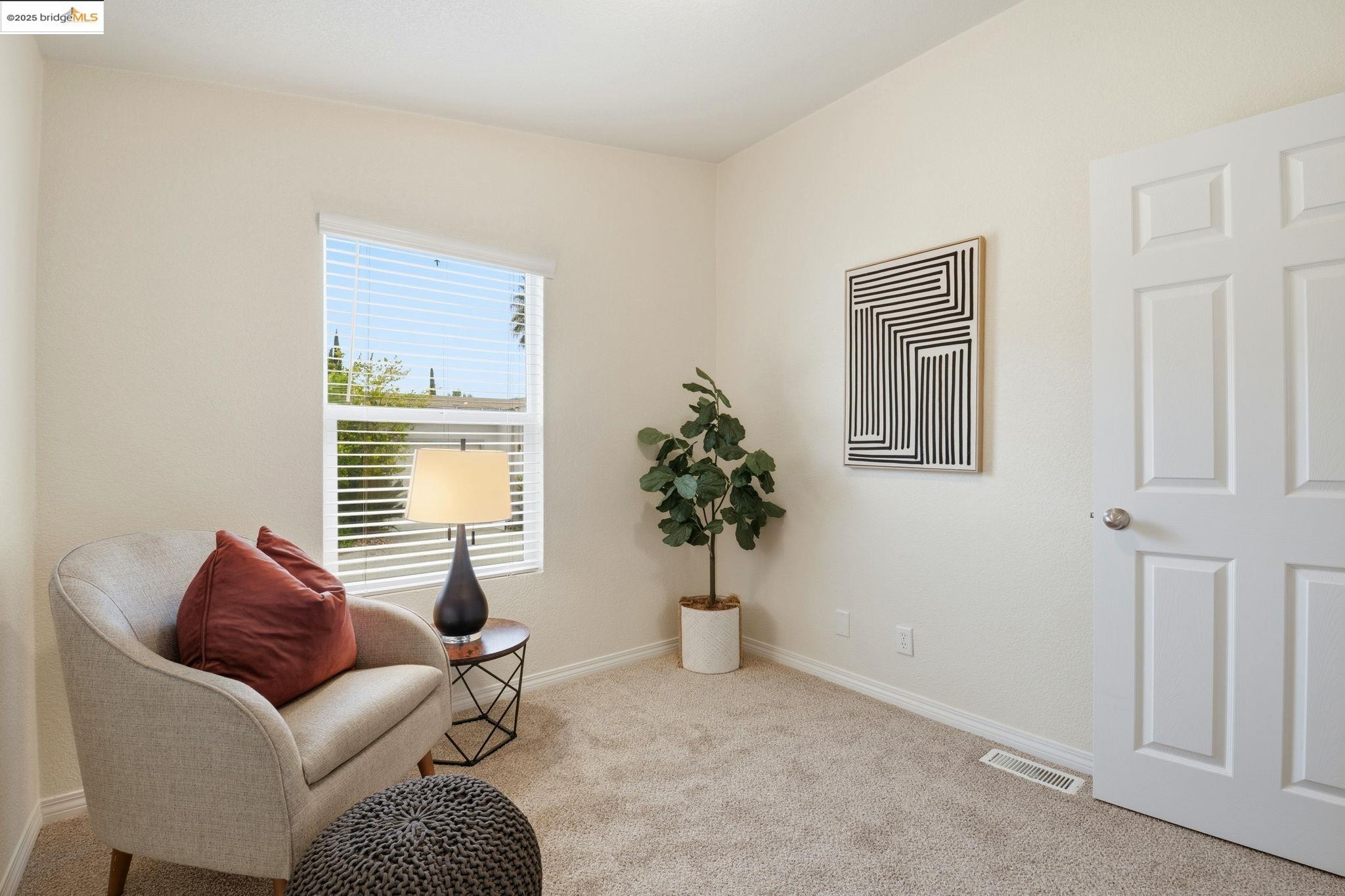 16711 Marsh Creek Road, Unit 111 Clayton, CA 94517 - Photo 22 of 34 a living room with furniture and potted plant