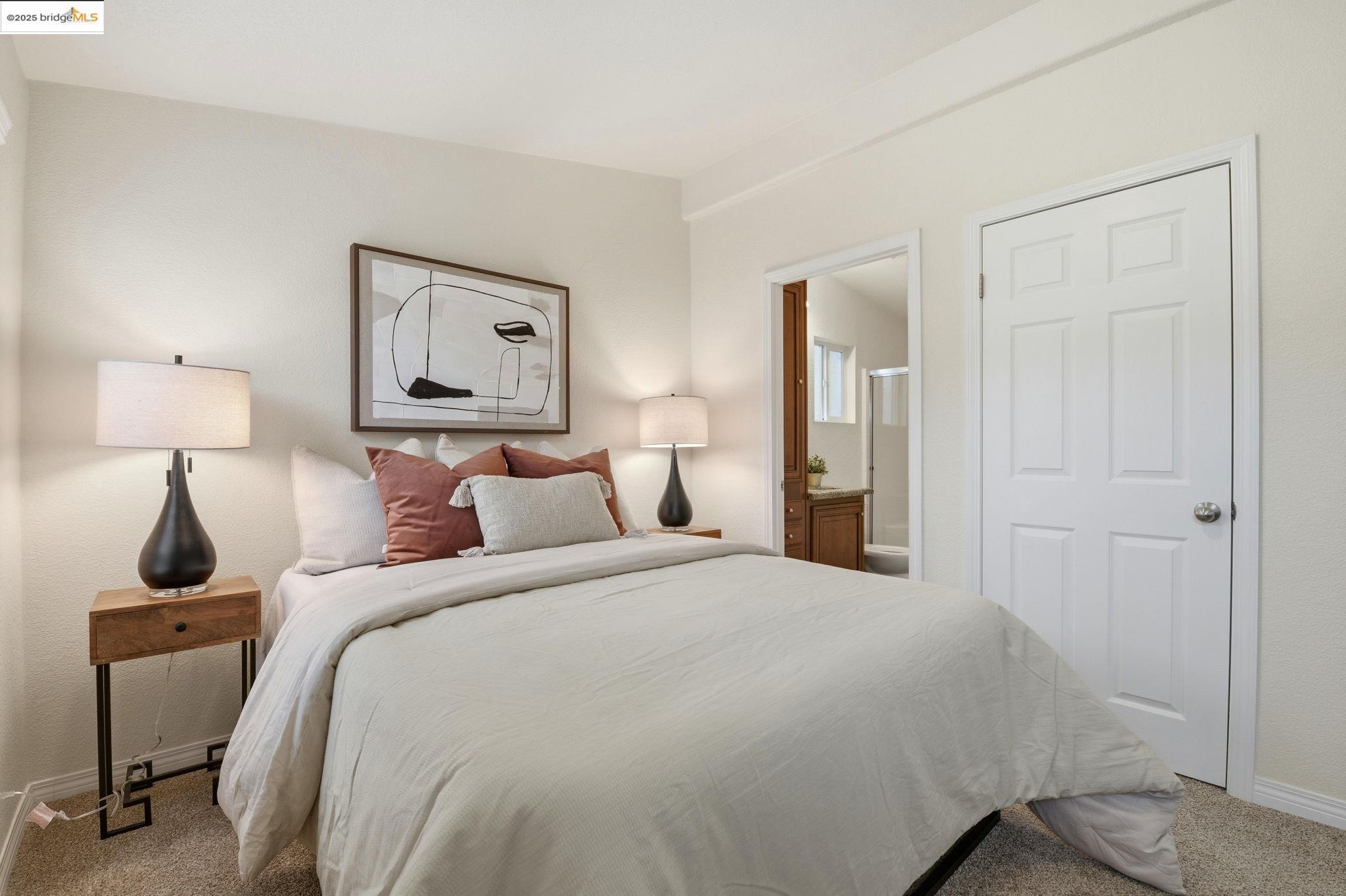 16711 Marsh Creek Road, Unit 111 Clayton, CA 94517 - Photo 23 of 34 a bedroom with a bed and a table