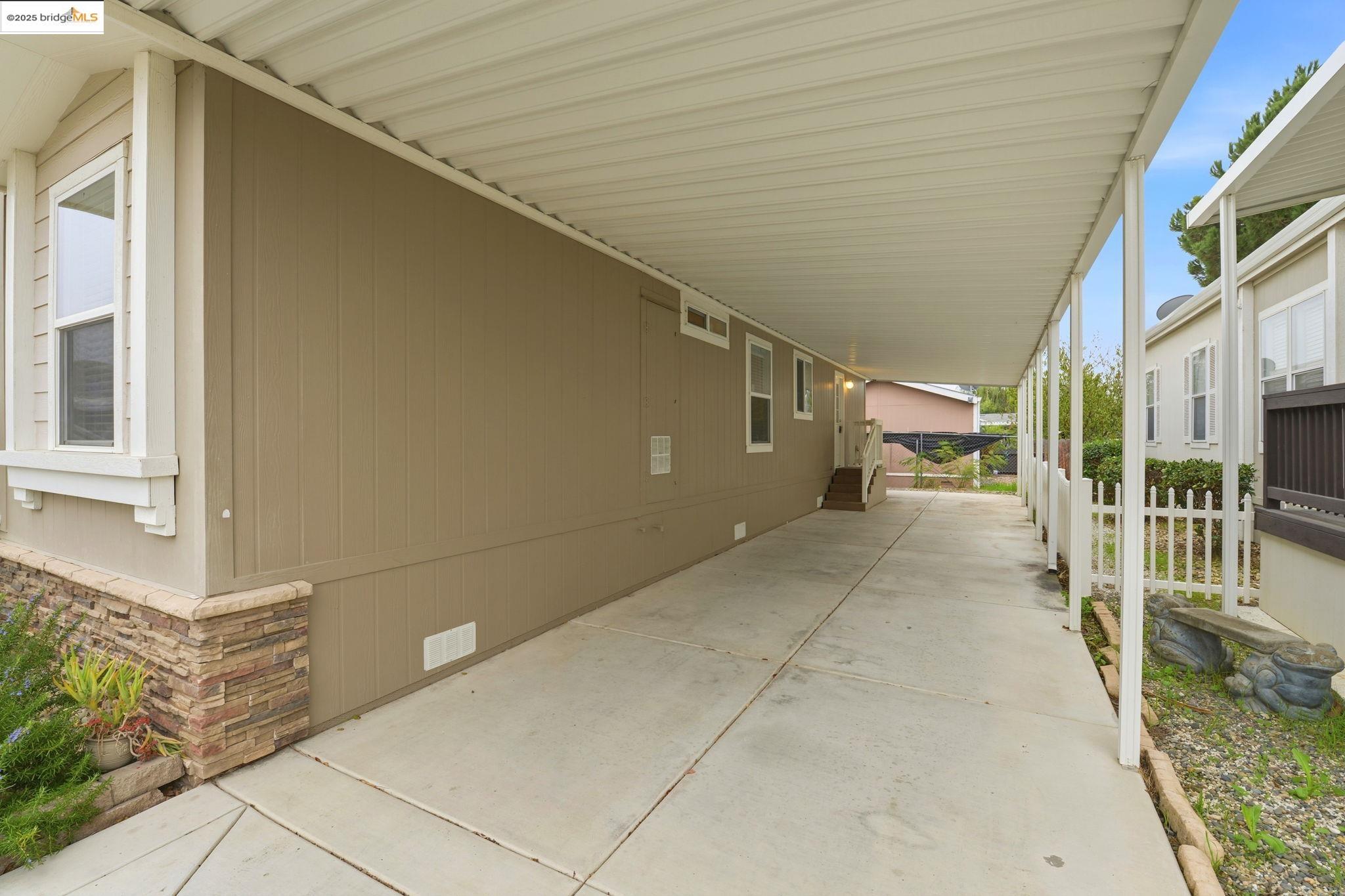 16711 Marsh Creek Road, Unit 111 Clayton, CA 94517 - Photo 31 of 34 a view of a house with a street