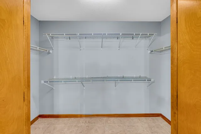 a view of a room with racks on the wall