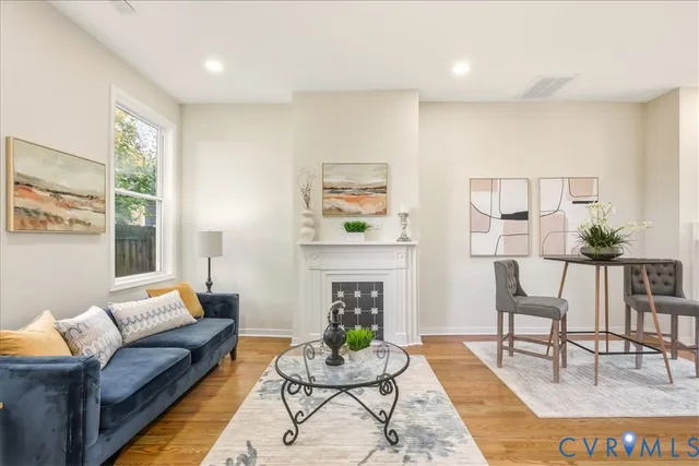 a large kitchen with kitchen island a large counter space and stainless steel appliances