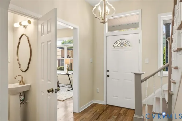 a bathroom with a sink a mirror and a shower