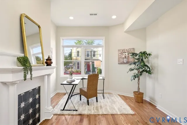 a living room with furniture and a table