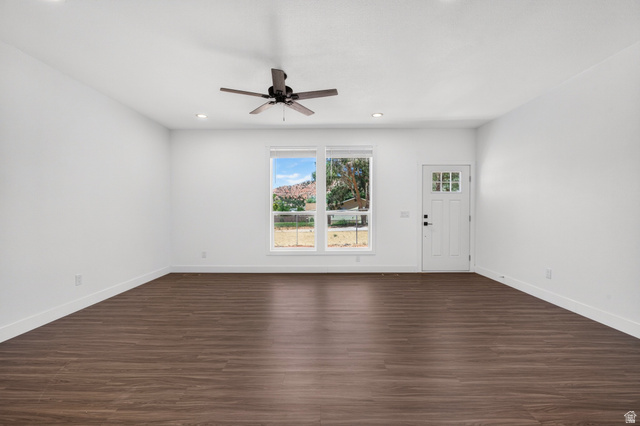 464 Jessop Avenue Hildale, UT 84784 - Photo 13 of 73 Spacious open-concept room featuring wood-finish flooring, recessed lighting, and a ceiling fan