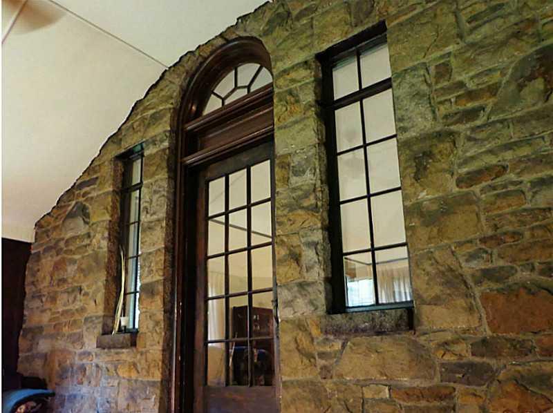1397 Abers Creek Road Monroeville, PA 15146 - Photo 13 of 25 Family Room. Looking back into the Living Room. This room measures 18 x 11 with vaulted ceilings and a beautiful stone wall.